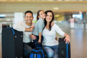 portrait of beautiful family at airport