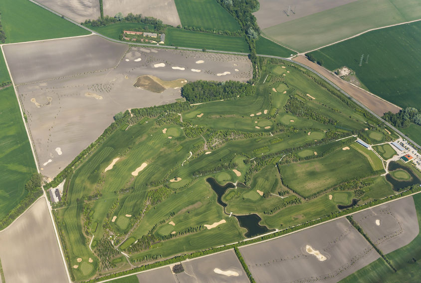aerial of empty golf range in schwechat